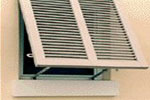 Islander Louvered shutters by Willard Shutter Co., Inc.
