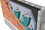 Solution for clogged weep holes in masonry cavity construction