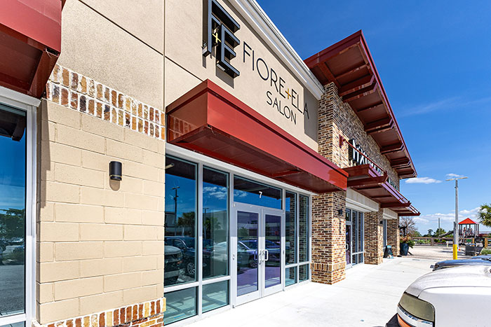 Case Study: Upscale Salon chooses StoCast Brick to bring Charm of Commercial Shopping Center Exterior into Luxurious Interior Space