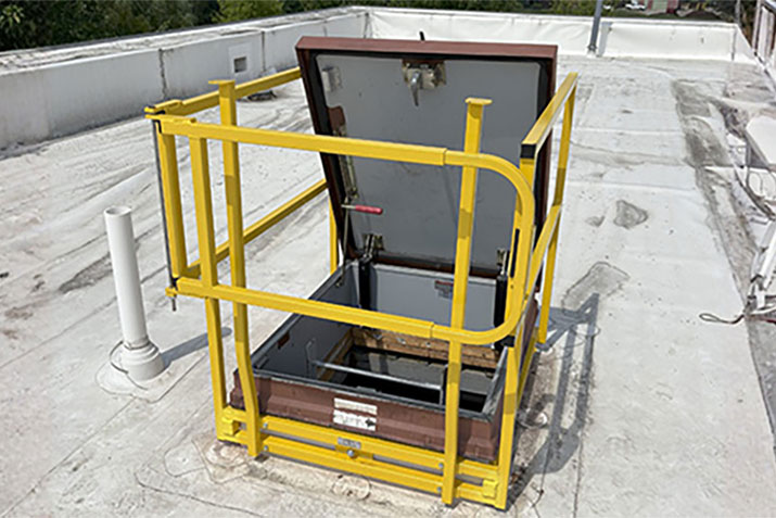 Roof Hatch Safety Reconsidered: LadderPort's Fixed Grab Bars as a Reliable Alternative to Telescoping Posts