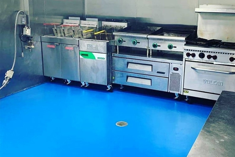 HERMETIC™ 4.8S Urethane Cement installed in a commercial kitchen. These specialty floors by Elite Crete Systems were engineered specifically for food & beverage environments and withstand high temperatures including forced steam cleaning.