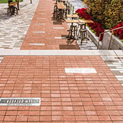 Wausau Tile - Paving the Village Red